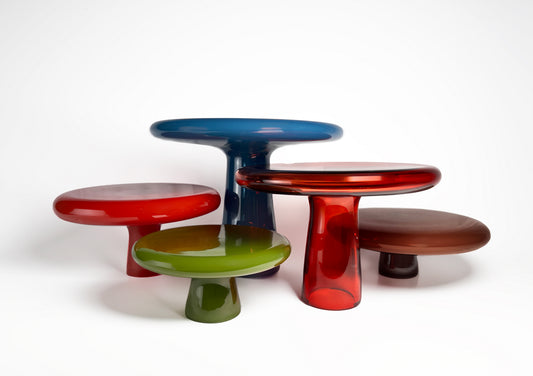 Set of various elevated glass platters